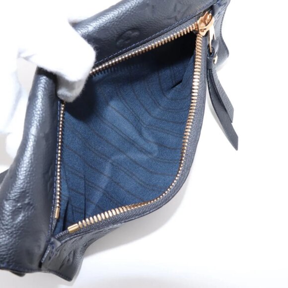 Louis Vuitton Monogram Empreinte Petillante Clutch - Picture 9 of 13